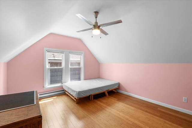 905 Harrison Ave, Saint Joseph, MI 49085 - bedroom with wood finished floors, baseboard heating, lofted ceiling, and ceiling fan