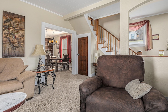 209 Maple St, Three Oaks, MI 49128 - carpeted living room with a chandelier, crown molding, and stairway
