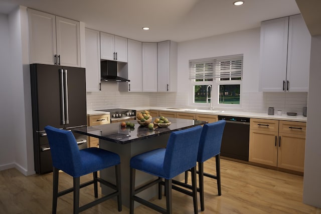 2670 Settlers Creek Rd, Fennville, MI 49408 - kitchen with freestanding refrigerator, dishwasher, extractor fan, stainless steel range, and a kitchen breakfast bar