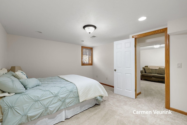 1723 S Sullivan Rd, Ravenna, MI 49451 - bedroom with light carpet and recessed lighting