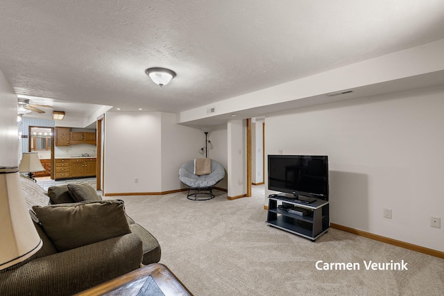 1723 S Sullivan Rd, Ravenna, MI 49451 - living room featuring light carpet and a textured ceiling
