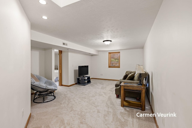 1723 S Sullivan Rd, Ravenna, MI 49451 - carpeted living room with recessed lighting and a textured ceiling
