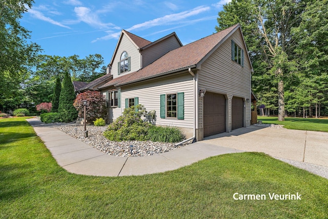 1723 S Sullivan Rd, Ravenna, MI 49451 - view of property exterior featuring driveway, roof with shingles, a lawn, and a garage