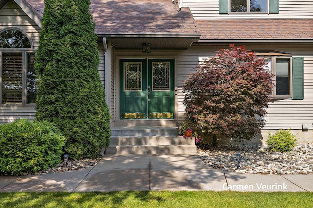 1723 S Sullivan Rd, Ravenna, MI 49451 - entrance to property with a shingled roof