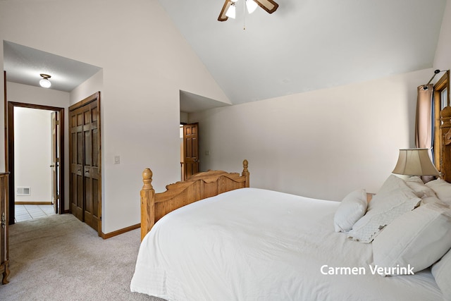 1723 S Sullivan Rd, Ravenna, MI 49451 - bedroom with vaulted ceiling, light carpet, a closet, and a ceiling fan