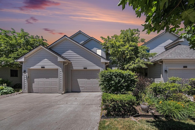 3350 Breckland Ct, Ann Arbor, MI 48108 - traditional-style house with concrete driveway and an attached garage