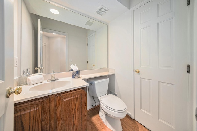 3350 Breckland Ct, Ann Arbor, MI 48108 - half bathroom with vanity and wood finished floors