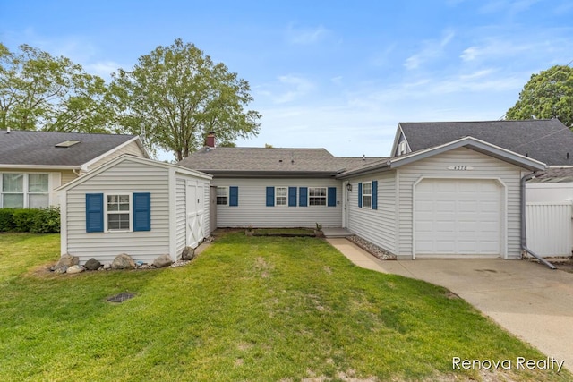 4278 W Joy Rd, Shelbyville, MI 49344 - view of front of property featuring an attached garage, concrete driveway, and a front yard