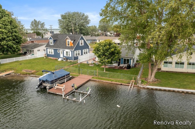 4278 W Joy Rd, Shelbyville, MI 49344 - dock area with boat lift, a water view, and a fenced backyard