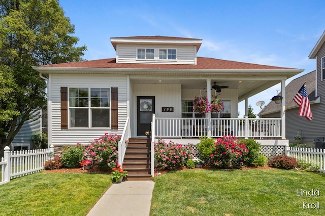 195 Liberty St NW, Sparta, MI 49345 - bungalow-style house with a porch, ceiling fan, and roof with shingles