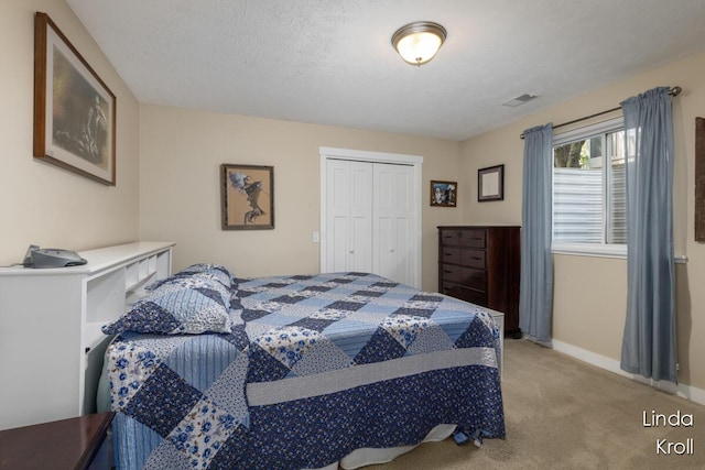 195 Liberty St NW, Sparta, MI 49345 - bedroom with light carpet and a closet