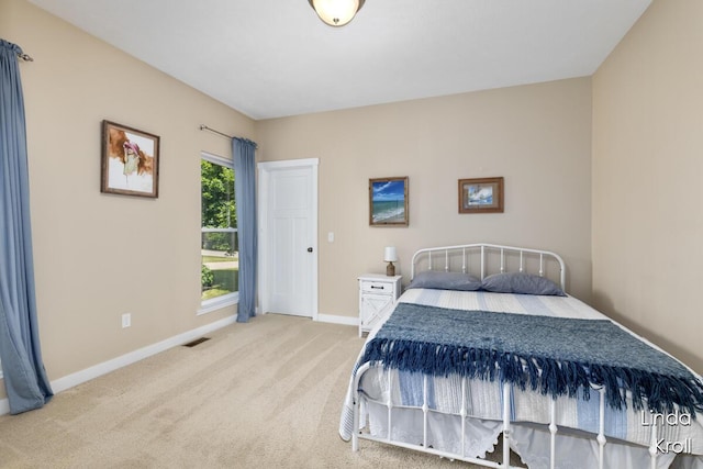 195 Liberty St NW, Sparta, MI 49345 - bedroom with baseboards and carpet flooring