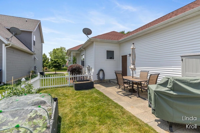 195 Liberty St NW, Sparta, MI 49345 - view of yard featuring a patio