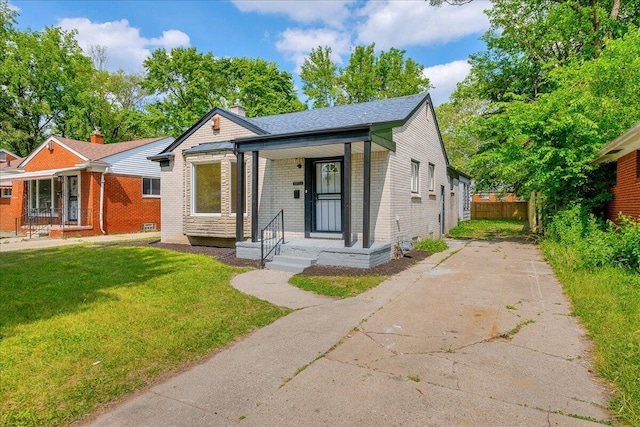 20232 Braile St, Detroit, MI 48219 - view of front of property with brick siding and a chimney