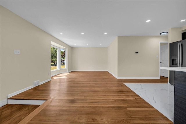 20232 Braile St, Detroit, MI 48219 - unfurnished living room featuring wood finished floors and recessed lighting