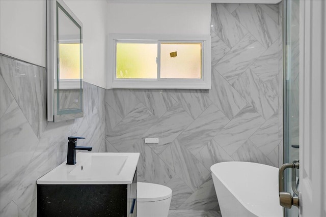 20232 Braile St, Detroit, MI 48219 - bathroom with tile walls, a freestanding tub, vanity, and marble finish floors