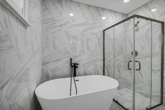 20232 Braile St, Detroit, MI 48219 - bathroom featuring a freestanding tub, a marble finish shower, and tile walls