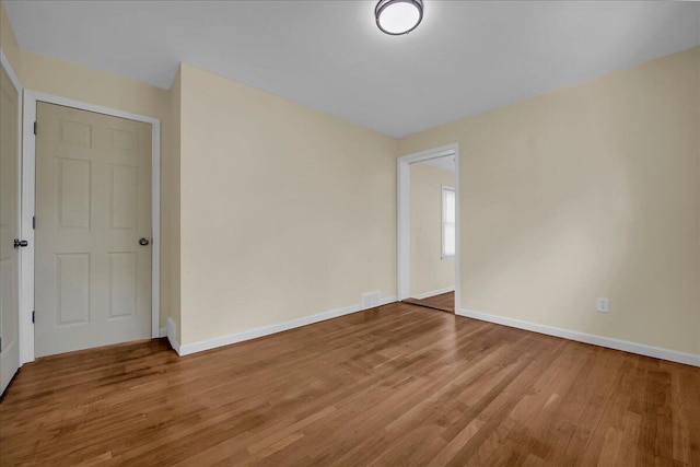 20232 Braile St, Detroit, MI 48219 - empty room featuring wood finished floors and baseboards