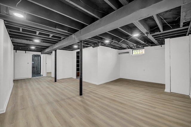 20232 Braile St, Detroit, MI 48219 - basement featuring light wood-style flooring