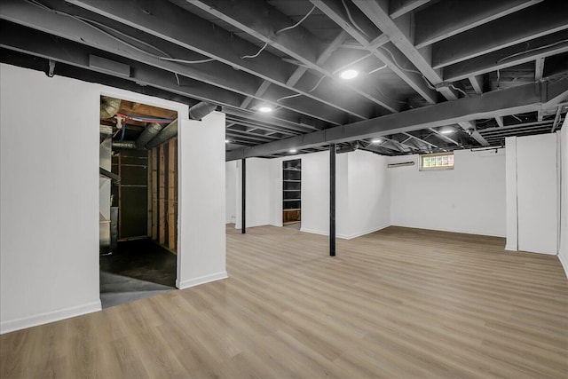 20232 Braile St, Detroit, MI 48219 - basement featuring wood finished floors