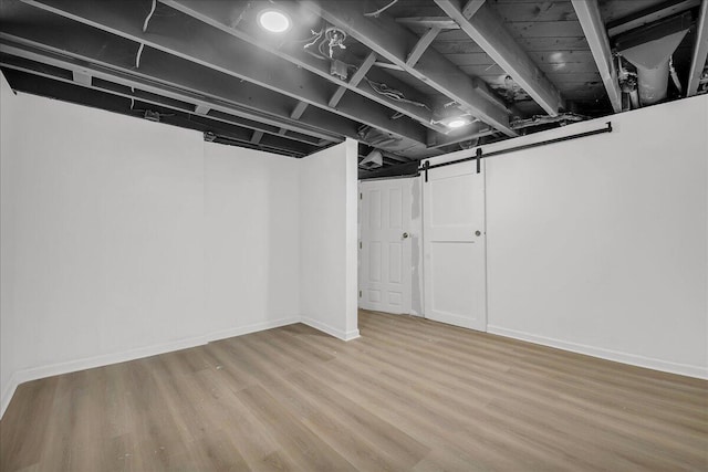 20232 Braile St, Detroit, MI 48219 - finished basement with wood finished floors and a barn door