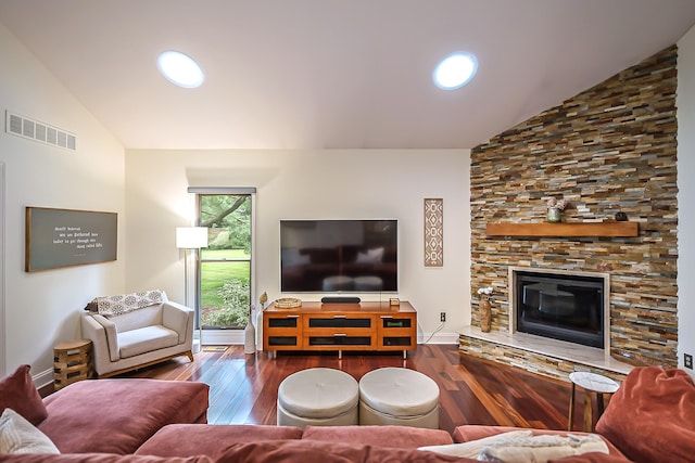 3185 Shadberry Ct, Saline, MI 48176 - living area with wood finished floors, high vaulted ceiling, and a fireplace