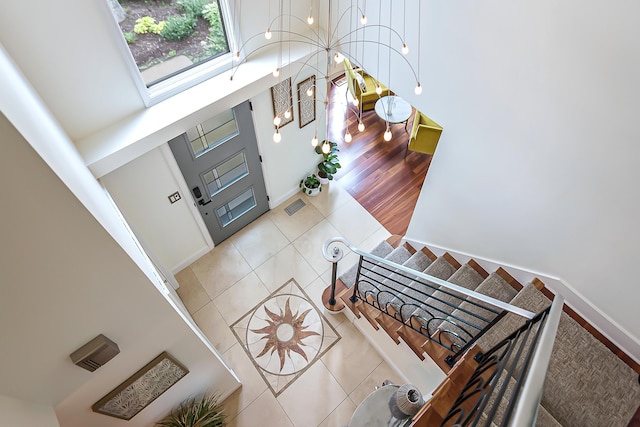 3185 Shadberry Ct, Saline, MI 48176 - foyer with tile patterned flooring and a high ceiling