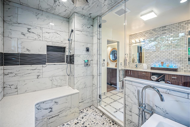 3185 Shadberry Ct, Saline, MI 48176 - bathroom featuring vanity, tiled shower, and a tub to relax in