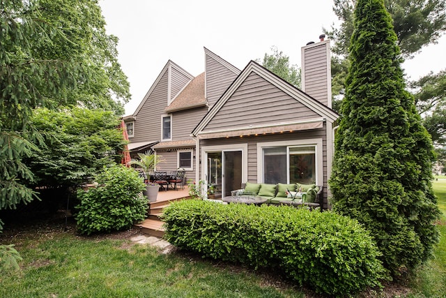 3185 Shadberry Ct, Saline, MI 48176 - rear view of property featuring outdoor lounge area, a wooden deck, a chimney, and a yard