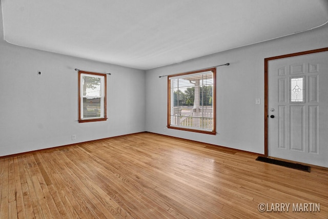 641 52nd St SE, Grand Rapids, MI 49548 - foyer with light wood-type flooring and plenty of natural light