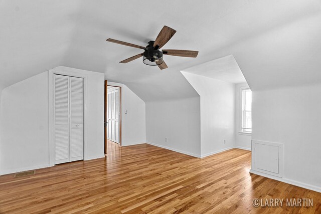 641 52nd St SE, Grand Rapids, MI 49548 - additional living space featuring a ceiling fan, lofted ceiling, and light wood-style floors