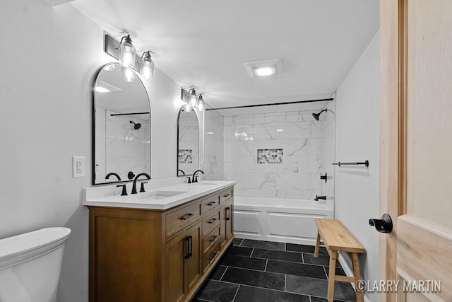 641 52nd St SE, Grand Rapids, MI 49548 - bathroom featuring double vanity and shower / bathtub combination