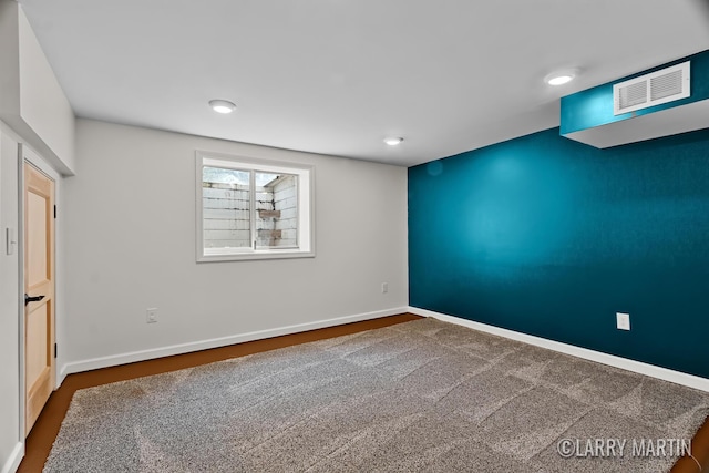 641 52nd St SE, Grand Rapids, MI 49548 - unfurnished room featuring dark carpet and recessed lighting