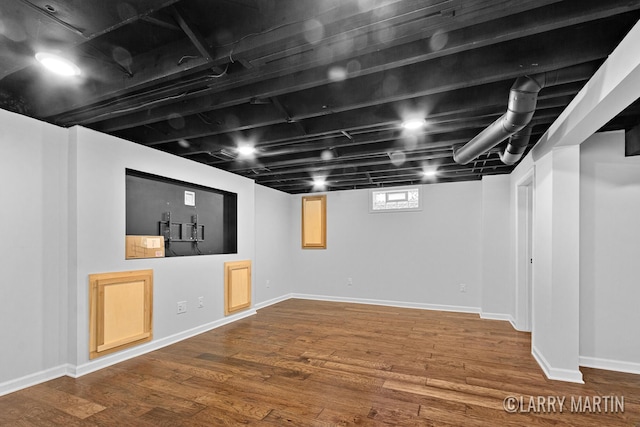 641 52nd St SE, Grand Rapids, MI 49548 - below grade area featuring wood finished floors