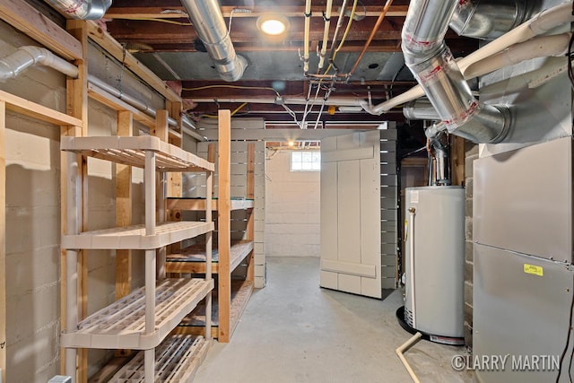 641 52nd St SE, Grand Rapids, MI 49548 - basement featuring gas water heater and heating unit