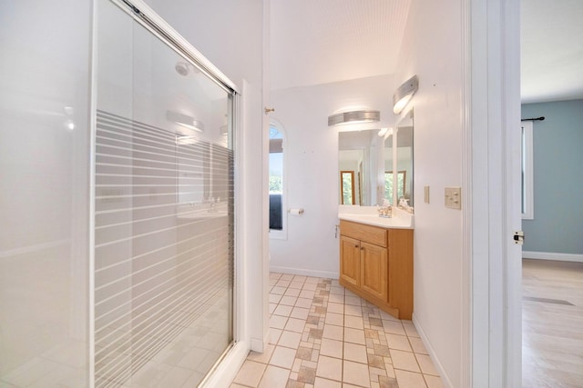 6990 Kennedy Rd, Munith, MI 49259 - full bathroom with vanity and a shower stall