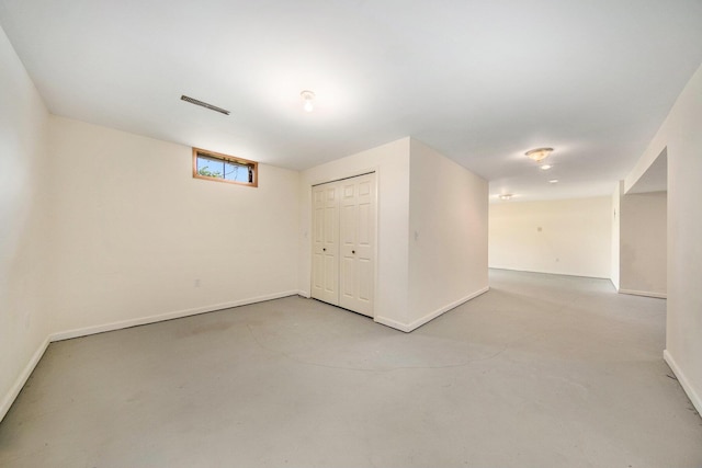 6990 Kennedy Rd, Munith, MI 49259 - unfurnished room with concrete flooring and baseboards