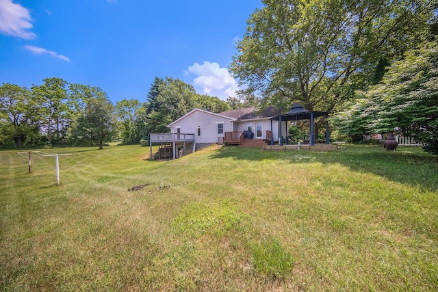 6990 Kennedy Rd, Munith, MI 49259 - view of green lawn featuring a gazebo and a wooden deck