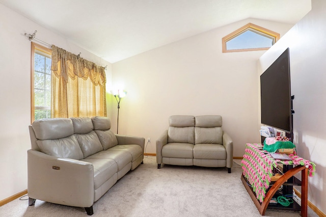 5767 E Grove Dr SE, Kentwood, MI 49512 - living area with lofted ceiling and light colored carpet