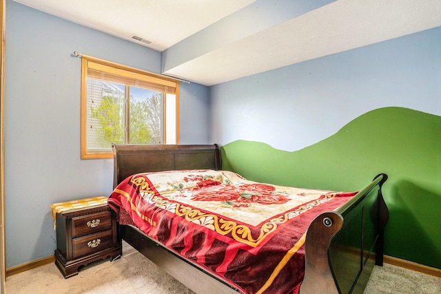 5767 E Grove Dr SE, Kentwood, MI 49512 - bedroom featuring light carpet and baseboards