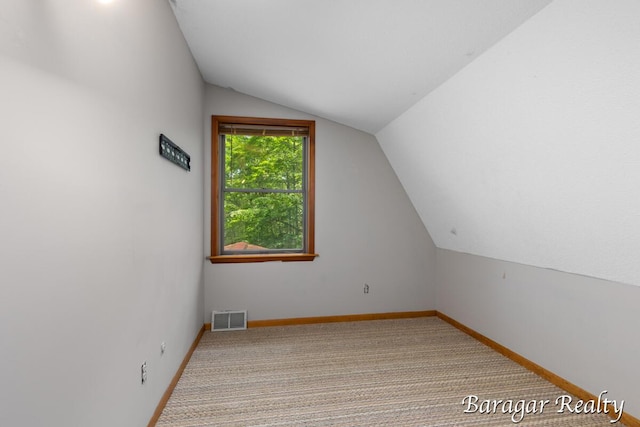 9550 Pere Marquette Dr, Stanwood, MI 49346 - bonus room featuring vaulted ceiling and carpet