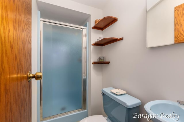 9550 Pere Marquette Dr, Stanwood, MI 49346 - full bathroom with a shower stall and toilet