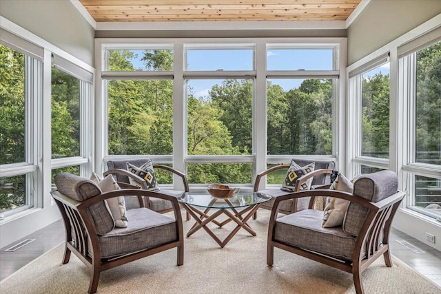 16128 Walnut Ct, Three Oaks, MI 49128 - sunroom featuring plenty of natural light, wood ceiling, and ornamental molding