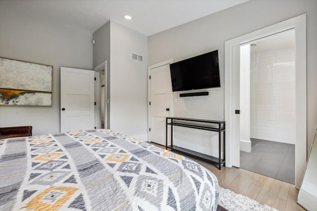 16128 Walnut Ct, Three Oaks, MI 49128 - bedroom with wood finished floors and recessed lighting