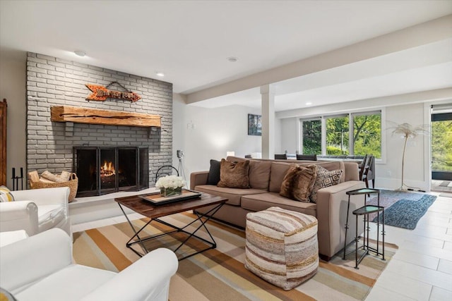 16128 Walnut Ct, Three Oaks, MI 49128 - living room with a brick fireplace, recessed lighting, and decorative columns