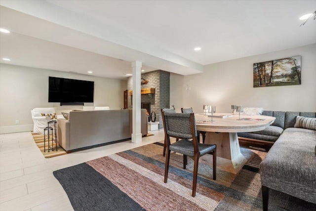 16128 Walnut Ct, Three Oaks, MI 49128 - dining area featuring a fireplace and recessed lighting