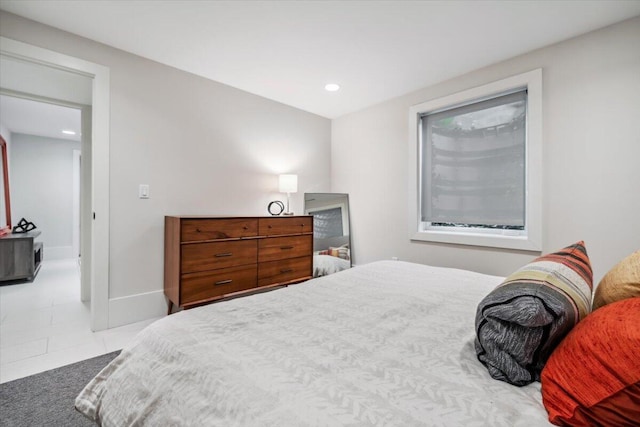 16128 Walnut Ct, Three Oaks, MI 49128 - tiled bedroom with baseboards and recessed lighting