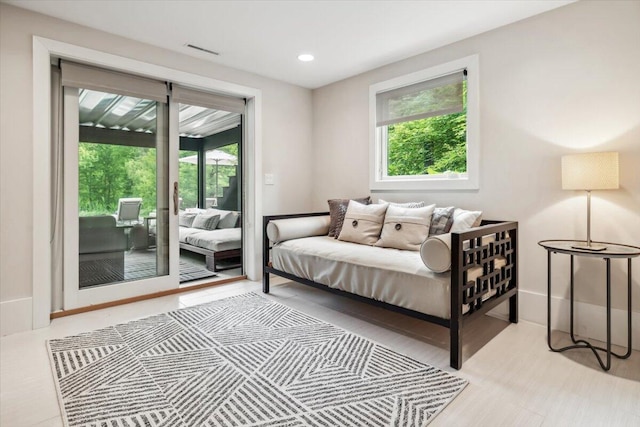 16128 Walnut Ct, Three Oaks, MI 49128 - bedroom with multiple windows, access to outside, and recessed lighting
