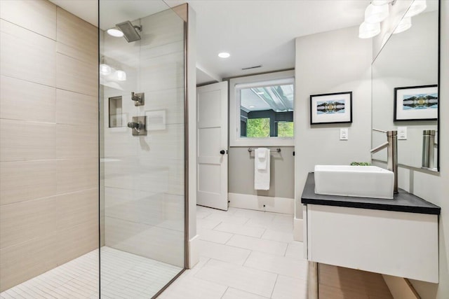 16128 Walnut Ct, Three Oaks, MI 49128 - bathroom featuring a walk in shower, vanity, and tile patterned floors