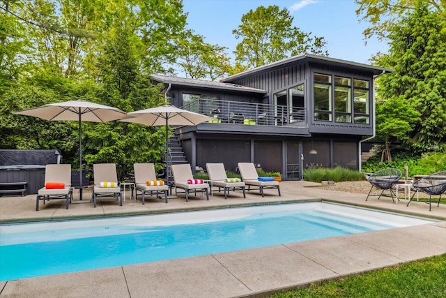 16128 Walnut Ct, Three Oaks, MI 49128 - outdoor pool featuring a patio area, a hot tub, and stairs